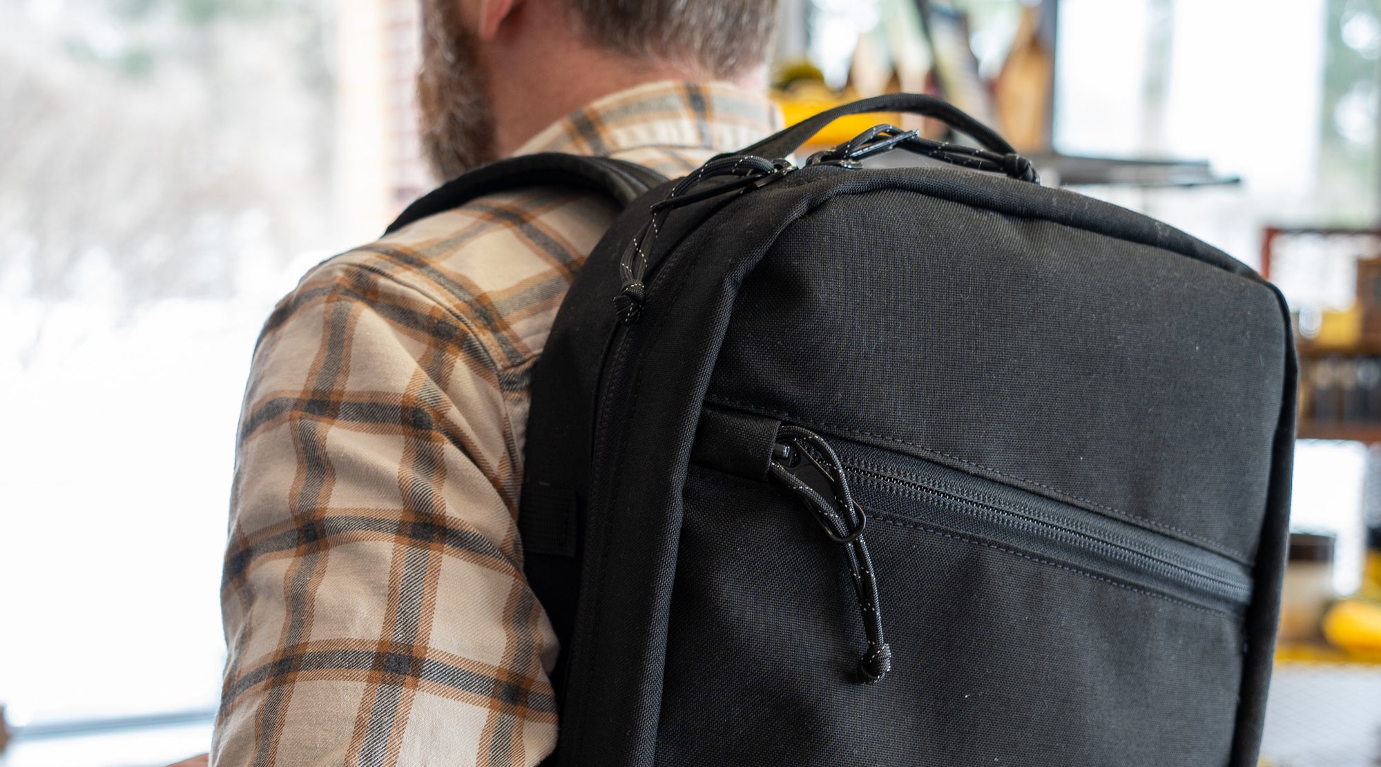 Man wearing 21L Black Backpack Made in USA