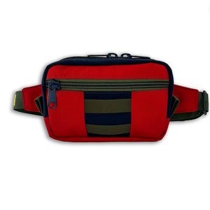 The Lane Sling Bag - where durability meets functionality for your everyday journey. Handcrafted with durable Red and Navy 1000D Cordura this sling bag will last years to come. Front view.