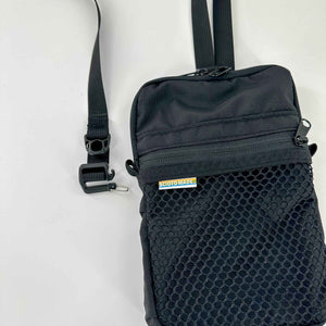 black crossbody bag - ripstop nylon - front view - showing buckle attachment
