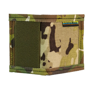 Camo bifold wallet with camo trim. Made to hold 8 to 12 cards and has a 2" exterior elastic cash strap on the back. Side and back view showing elastic olive green cash strap.