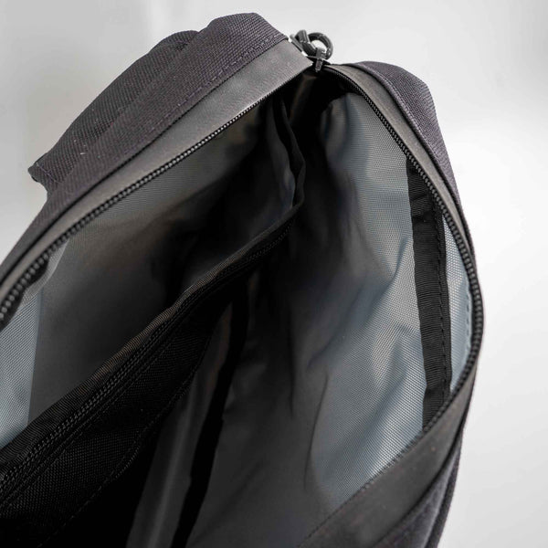 Inside view of the city sling bag.  Interior color is silver. 