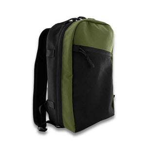 The 21L Backpack is large enough for a multi-day trip and simple enough for everyday use. Side View in Olive and Black.