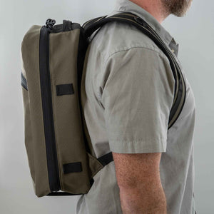 21L backpack shown in ranger green. side view.