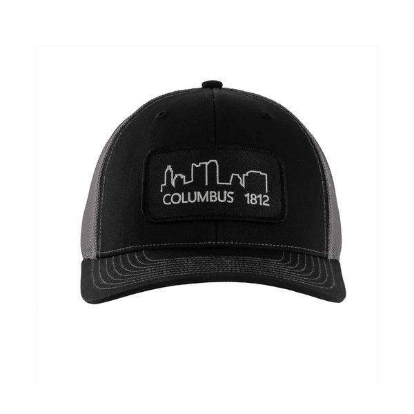 Scioto Made Trucker Hat with Columbus skyline 1812 patch. Black with gray mesh. 