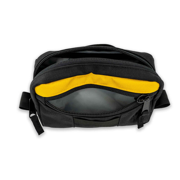 Lane Sling bag made from black and yellow 1000D Cordura. Front view showing front exterior pocket. 