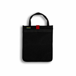 Scioto Made iPad Sleeve. Features outside mesh pocket and bright red interior. All Black exterior with red pull tab for mesh pocket.  Carrying handle on top.  Size 10" x 12".