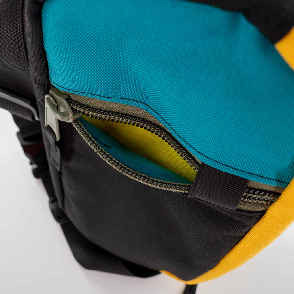 The Hayden sling bag is ready to go on any adventure!  This urban sling bag is made for everyday travel and hiking. Made with 1000D Cordura, it’s rugged enough to take on your hiking adventures and light enough for a trip to your favorite outdoor patio.  Inside view of fleece lined pocket on the front.